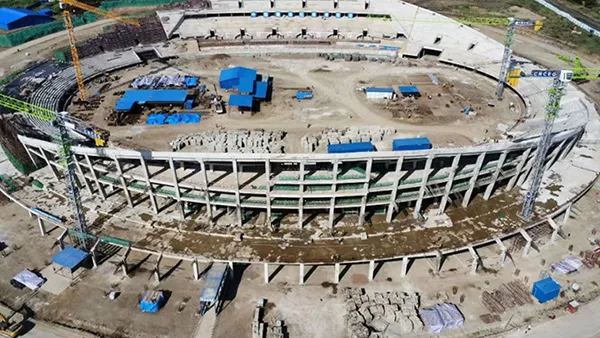 Tower cranes at the Arusha Stadium construction project in Tanzania
